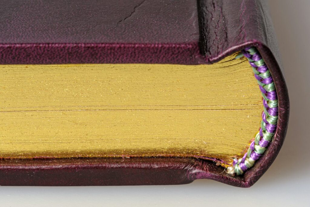 Illustrative closeup of a book with string, not a particular bookbinding thread product
