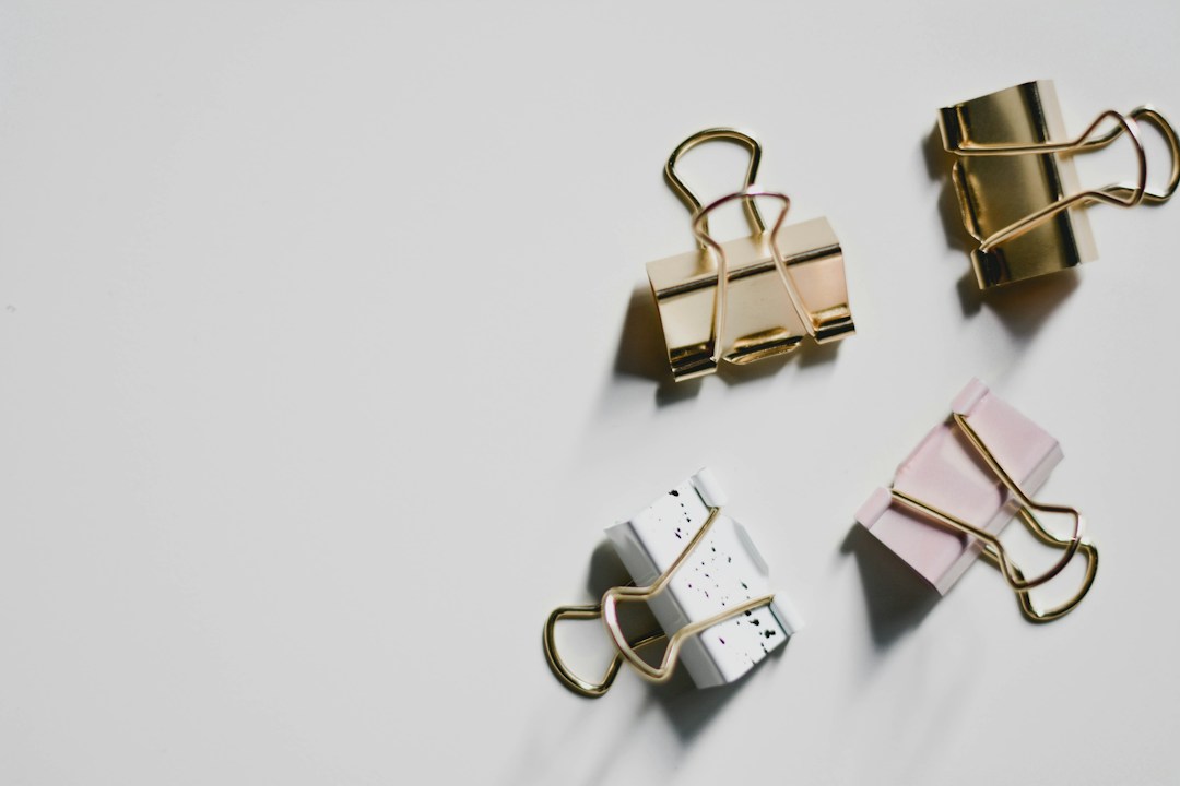 Gold metal letter clips and stationery