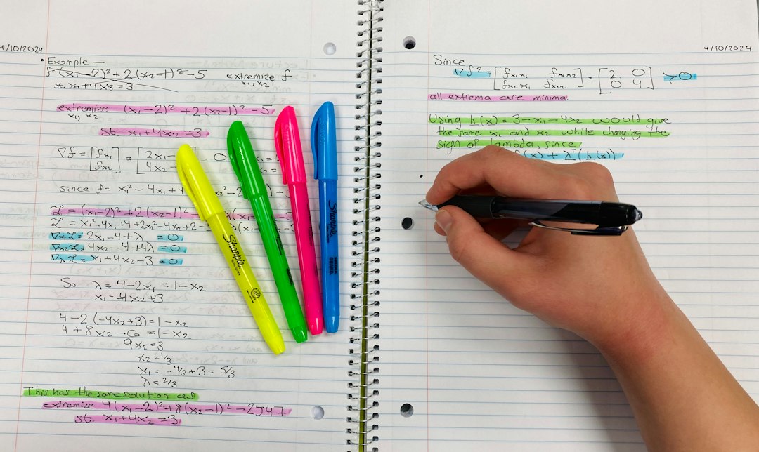 Person studying with highlighters