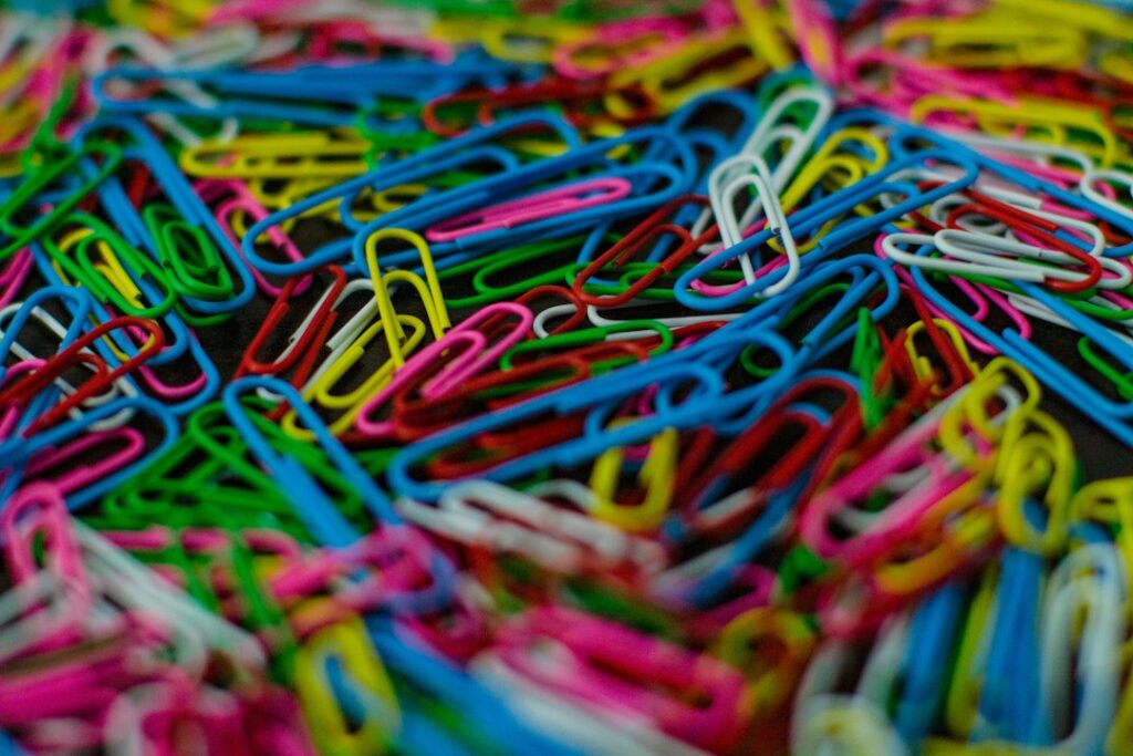 Metal paper clips on a desk