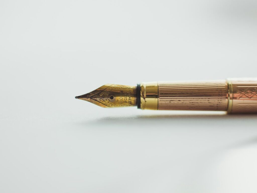 Illustrative stationery pen photograph, not a nib-width product comparison