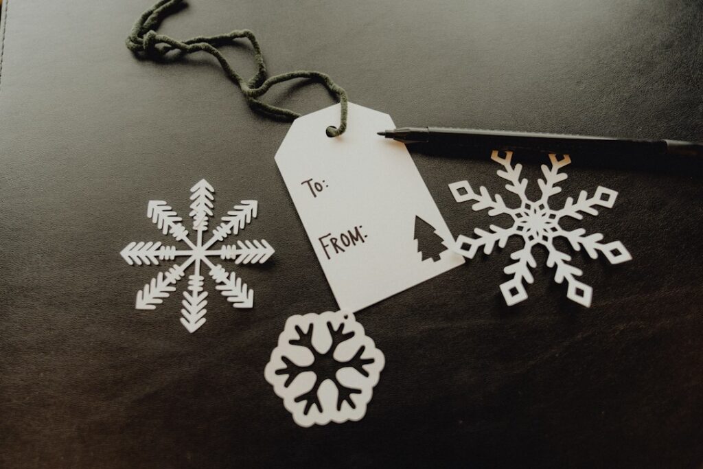 Scissors and cut paper craft shapes