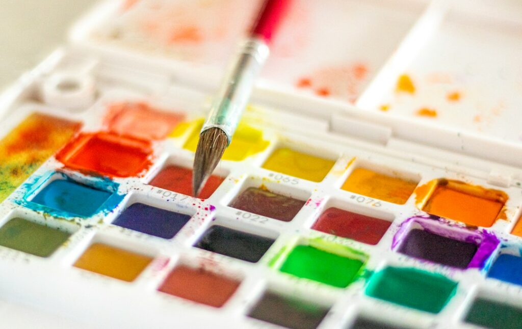 Watercolour paintbox and brush