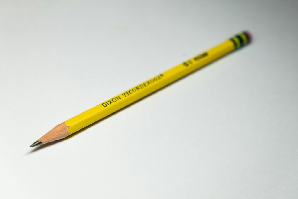 Wooden graphite pencils on a writing desk