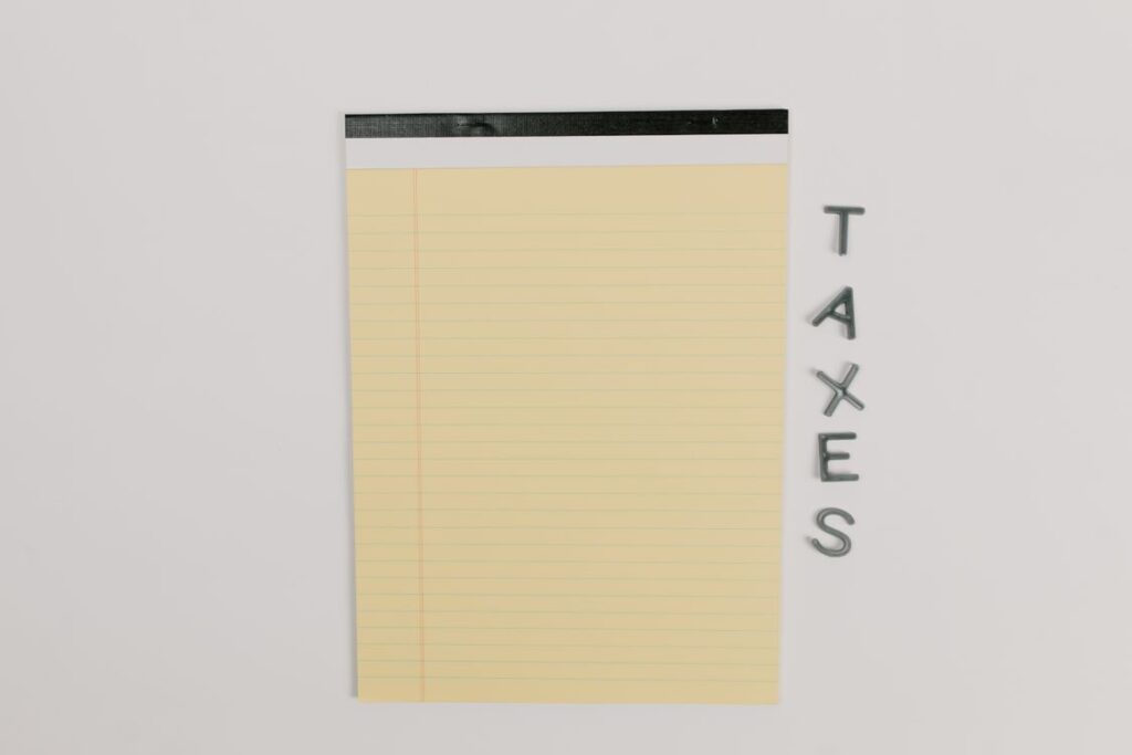 Yellow legal pad on a clean white surface