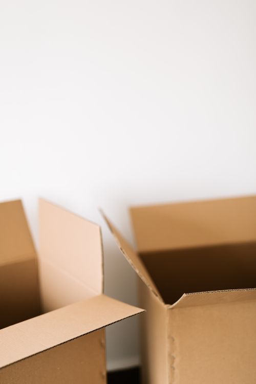 Printed mailing labels and envelopes arranged on a clean desk