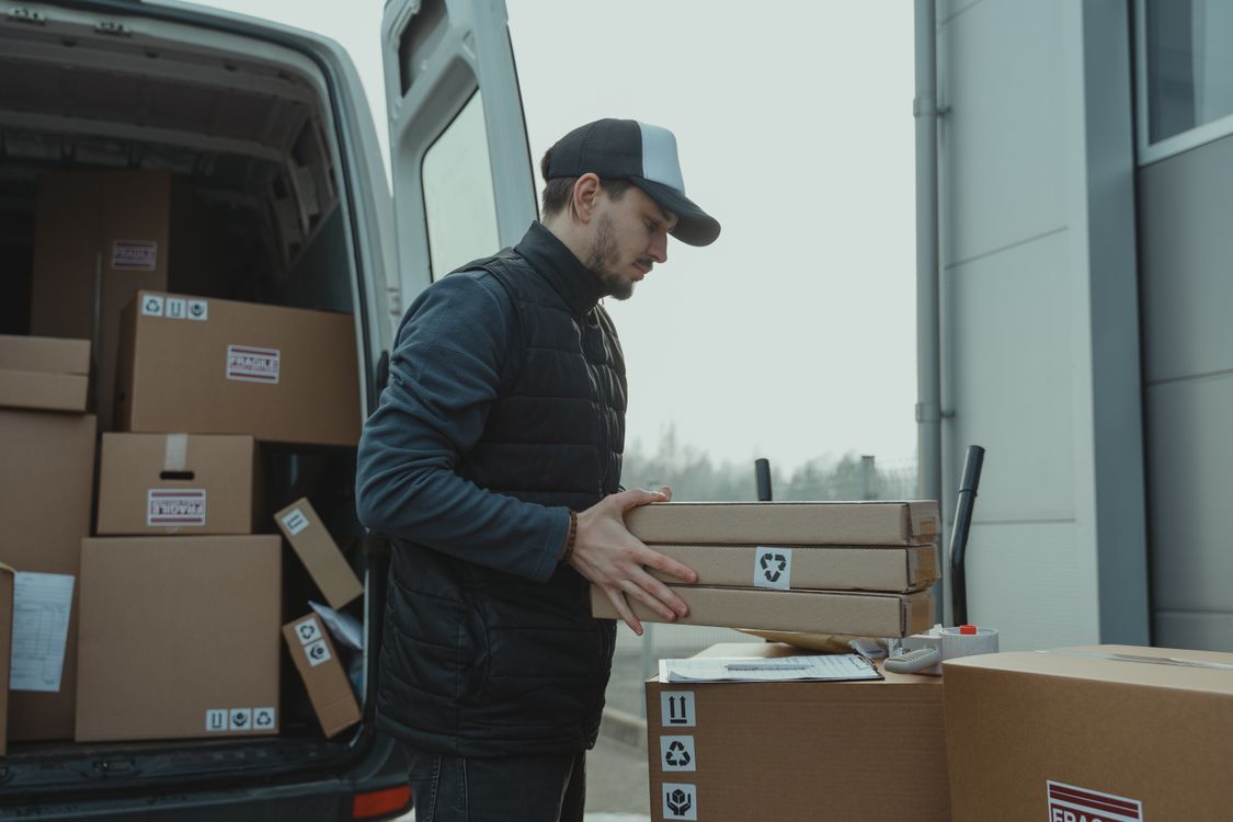 Small parcel being weighed and prepared for shipping