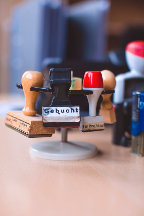 Close-up of office rubber stamps ready for document work