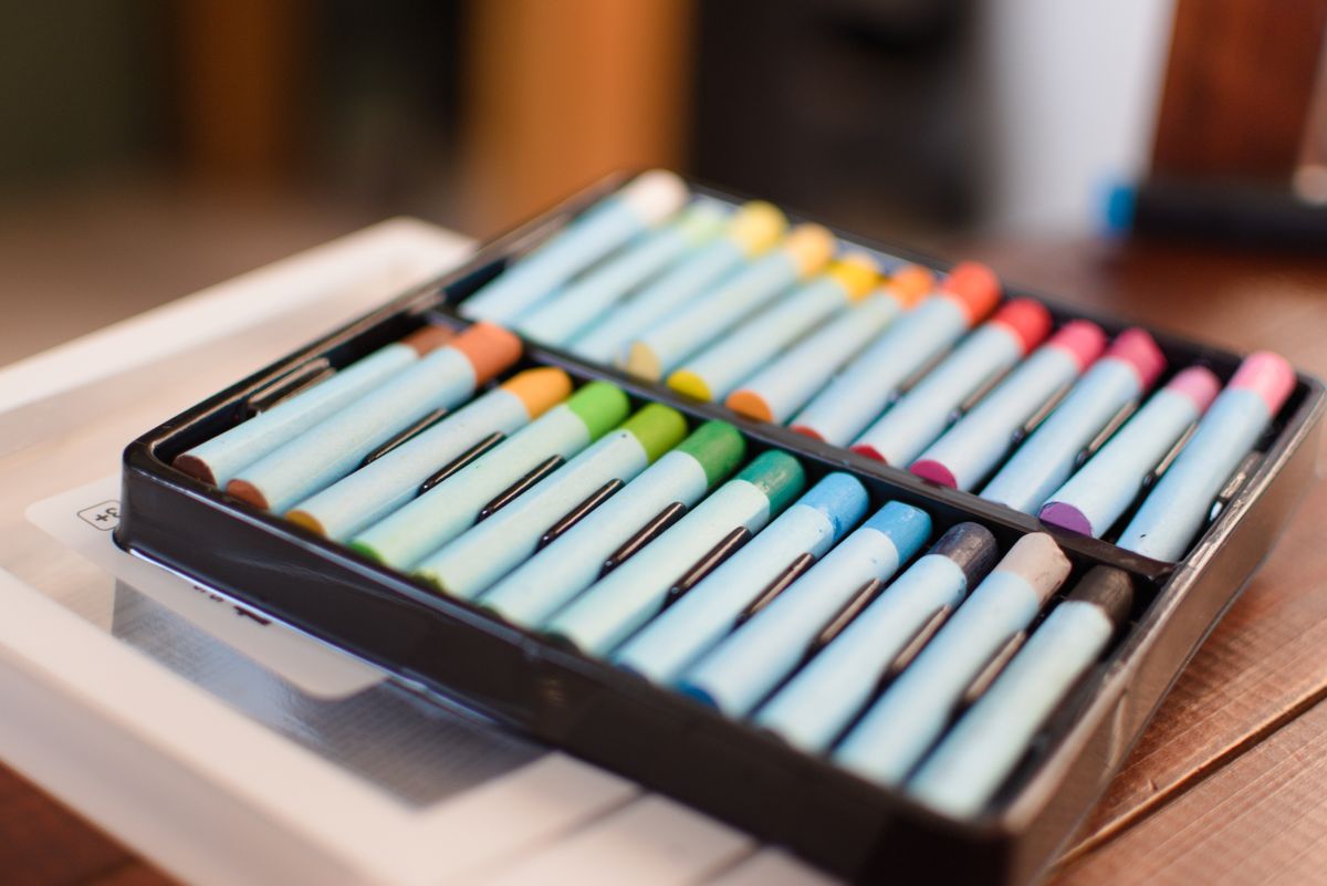 Coloured pastel sticks in a case