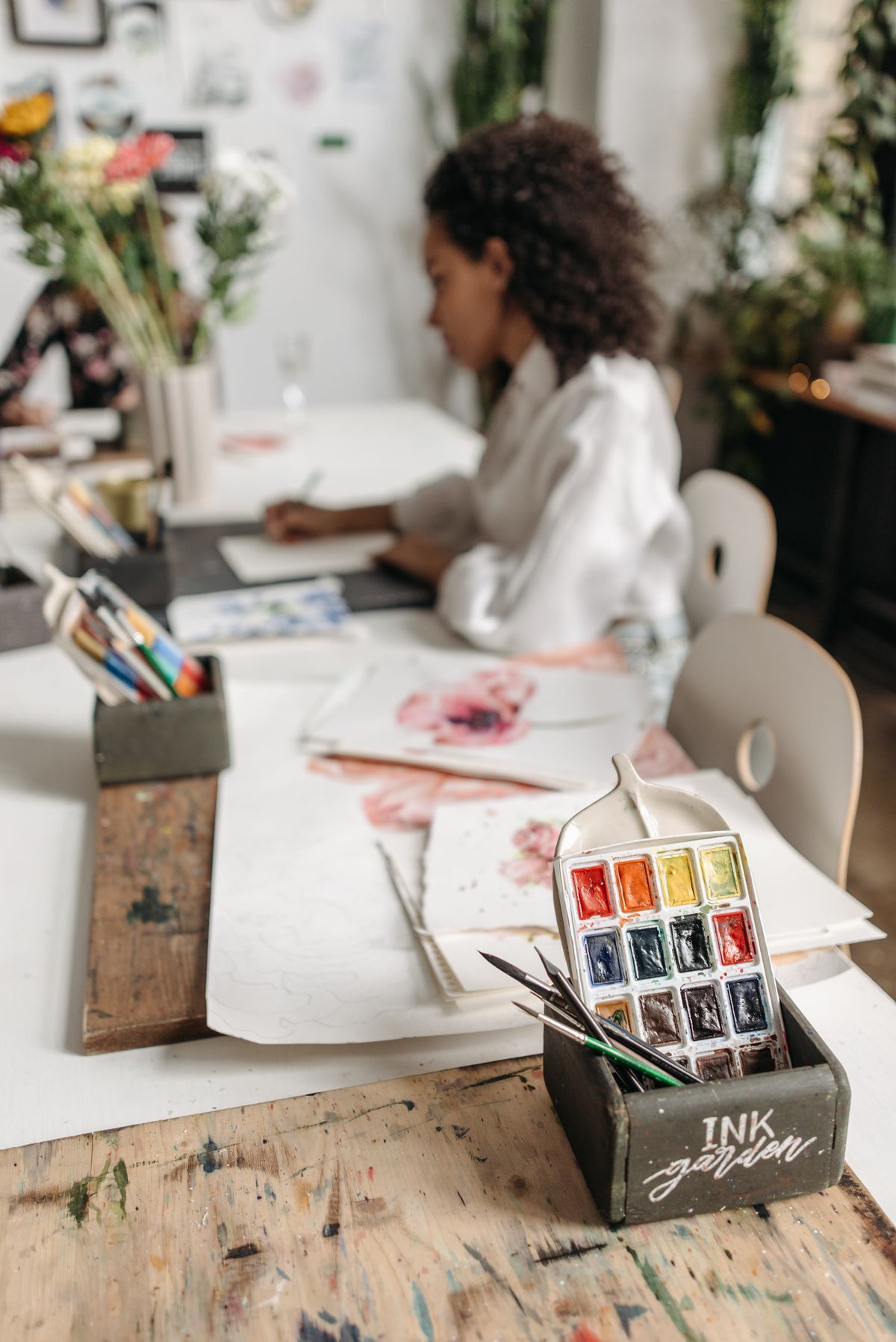 Artist working with watercolours